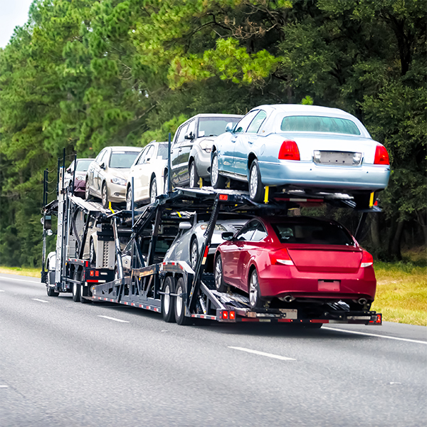 open car transport refers to transporting cars on an open trailer, where they are exposed to weather conditions